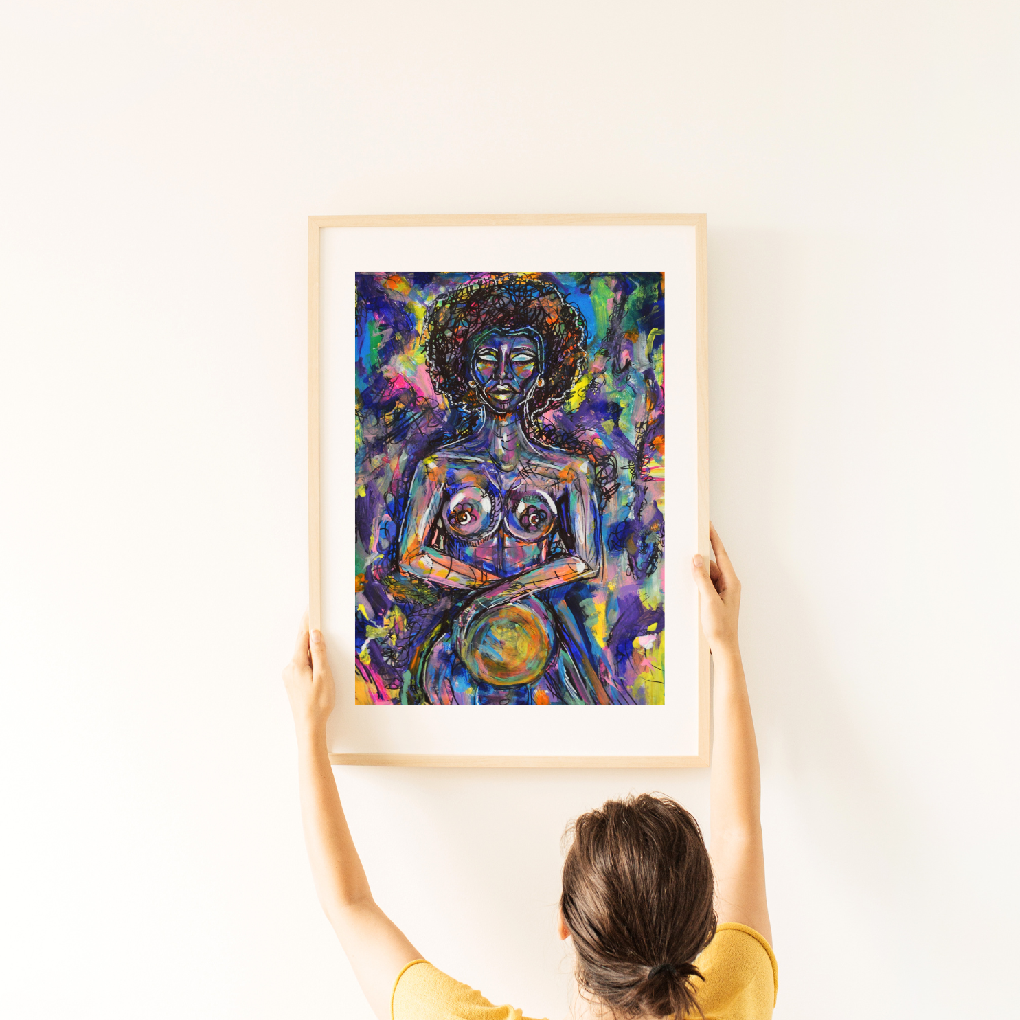 Adorn your space with 'Crystal Ball,' a vibrant A3 acrylic masterpiece framed in light wood, now gracing a pristine white wall. This serene artwork features a woman immersed in an exotic palette of dark blues and vibrant tones, captivating amidst bold black lines. Elevate your home decor with this captivating centerpiece